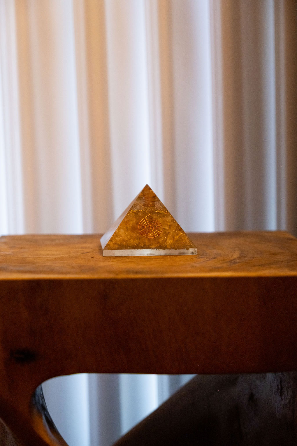 Custom Feng Shui packages Perth - Golden pyramid representing tailored energy solutions